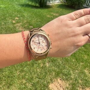 MK rose gold watch